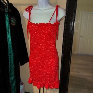 Red floral mini dress. Size medium. Never worn tags still on